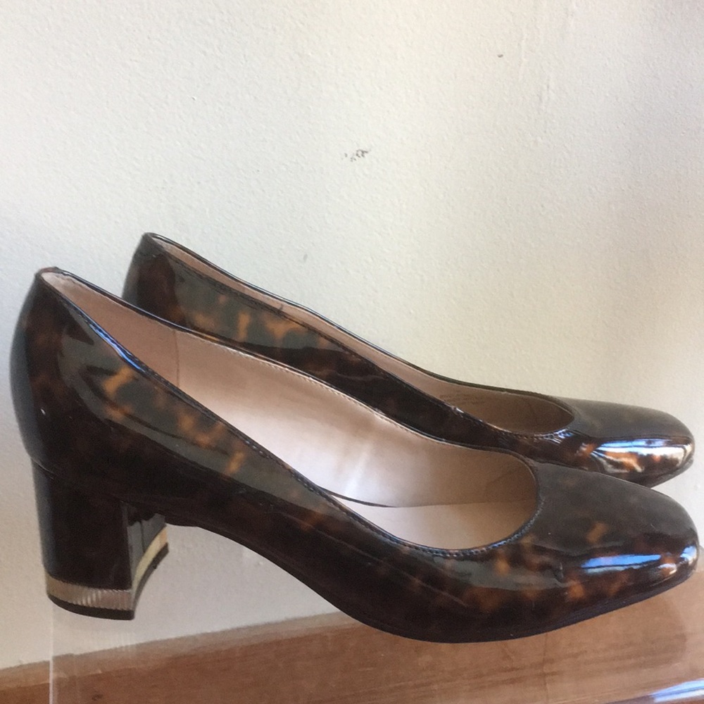 Bandolino pump. Copper & black animal, print square-toed. Patent upper. Size 7